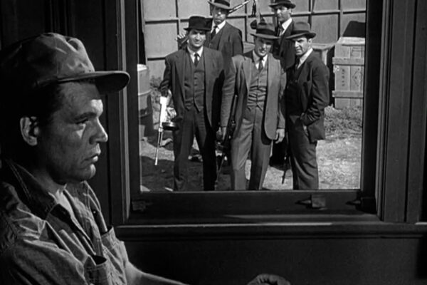 In a composite shot, Capone contemplates his future at Alcatraz after The Untouchables prevent his escape.