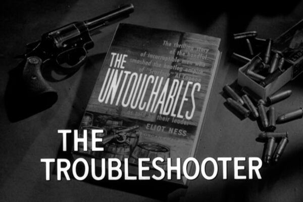 "The Troubleshooter" originally aired on October 12th, 1961. Suffering from federal raids, the syndicate hires a devious fixer from New York who works to undermine Eliot Ness.